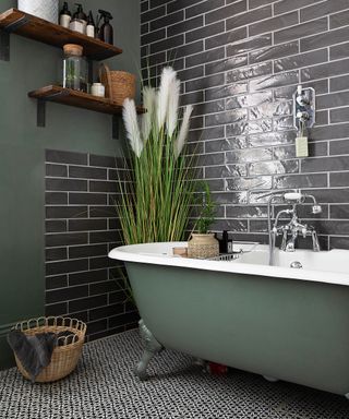 roost episode 3 - a bathroom with black and white tile floor and green claw bath - Wilshaw-CREDIT-Katie-Lee
