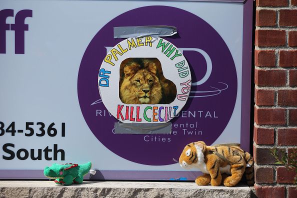 Outside the office of the dentist accused of killing Cecil the lion.