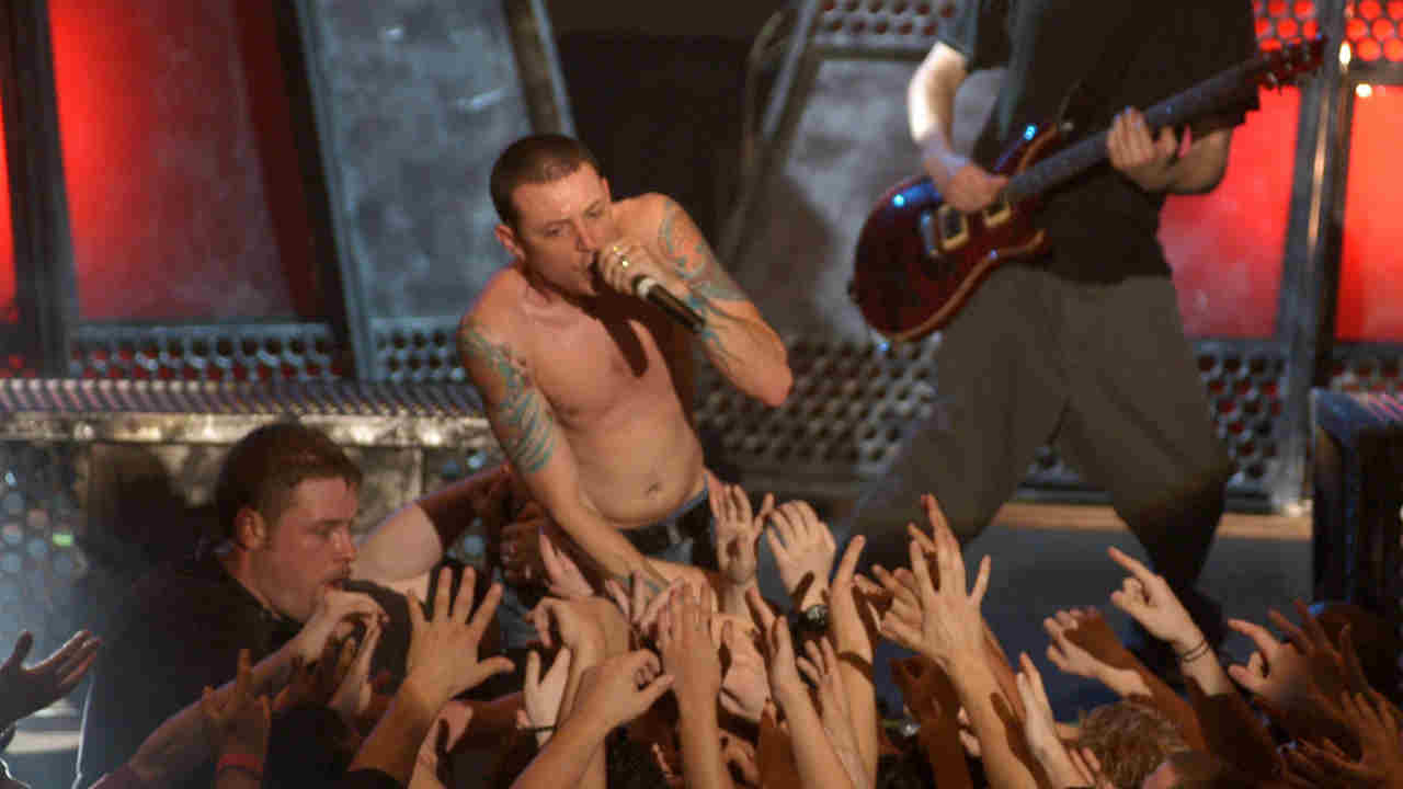 Linkin Park&amp;rsquo;s Chester Bennington performing onstage in 2003