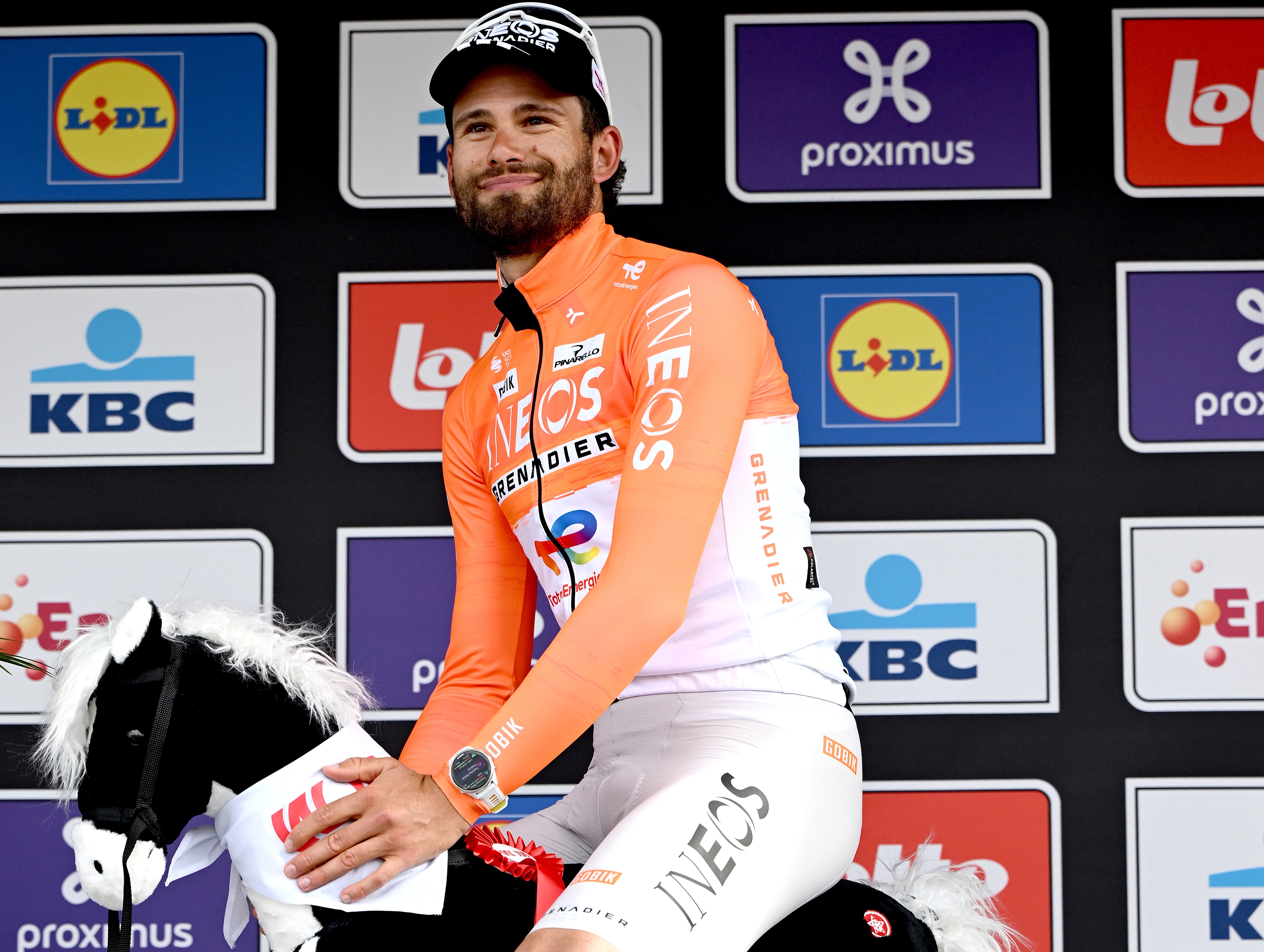 WAREGEM, BELGIUM - APRIL 01: Filippo Ganna of Italy and Team INEOS Grenadiers celebrates at podium as race winner during the 80th Dwars Door Vlaanderen 2026 - Men's Elite a 184.6km one day race from Roeselare to Waregem / #UCIWT / on April 01, 2026 in Waregem, Belgium. (Photo by Dario Belingheri/Getty Images)