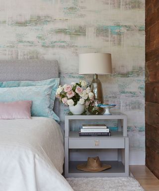 shabby chic bedroom with wallpapered wall