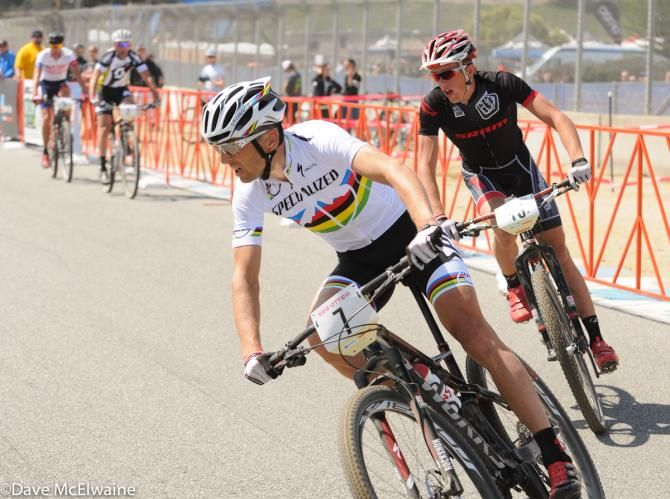 Christoph Sauser (Specialized) riding second wheel with one lap to go