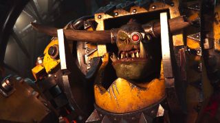 A menacing orc-like creature with sharp teeth and a red mechanical eye, encased in bulky, yellow armor adorned with spikes and gears, exudes a fierce, intimidating tone.