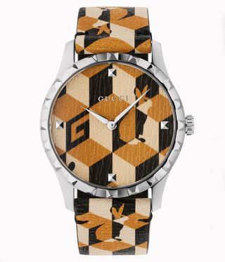 Gucci watch with rabbits on, with brown and black graphic pattern