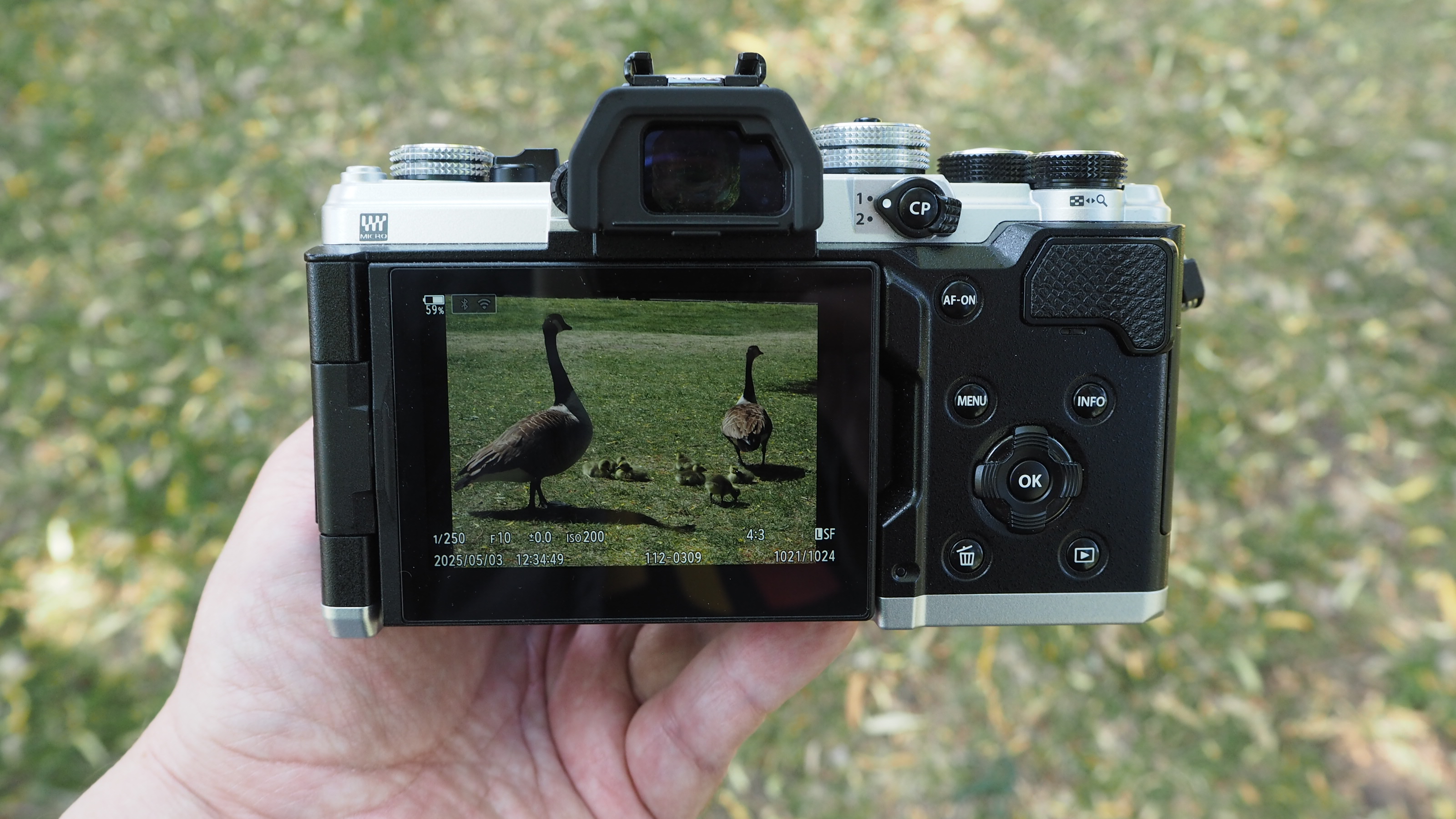 OM System OM-3 in the hand