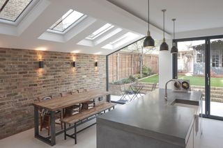 kitchen extension with wall lighting in dining space