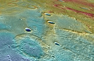 This view of Mercury from NASA's MESSENGER spacecraft looks west across a linear scarp that separates two different terrains, one higher on the right (in red and yellow) and one lower at the left (in blue colors).
