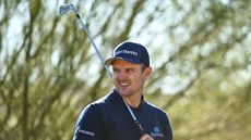 Justin Rose looks confused following iron shot