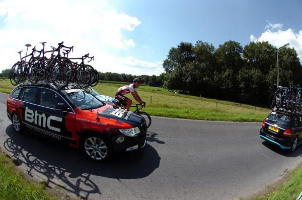 Race leader Taylor Phinney drops back to his team car.