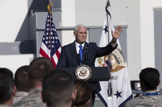 Vice President Mike Pence speaks at NASA's Kennedy Space Center in Cape Canaveral, Florida, unveiling the Trump administration's plan for a new U.S. Space Command, while attending SpaceX's attempted launch of a new GPS III navigation satellite for the U.S. Air Force on Dec. 18, 2018.