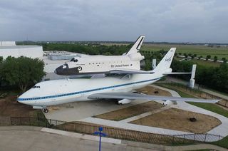 NASA's original Shuttle Carrier Aircraft and replica Independence orbiter as seen at Space Center Houston in May 2015.