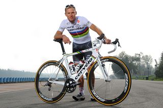 Cervélo TestTeam's Thor Hushovd poses in his new road race world champion's jersey – the same design as the one for sale here on eBay – and matching Cervélo bike in late 2010
