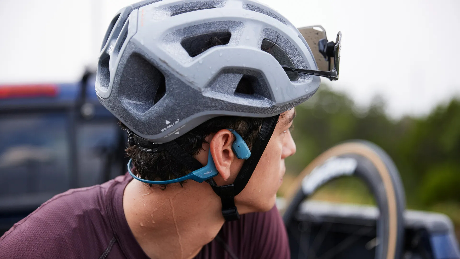 Man wearing the Shokz OpenRun Pro 2 headphones