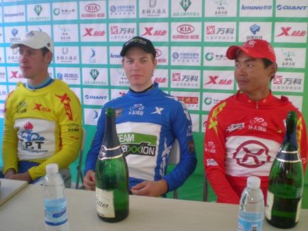 Happy leaders Boris Shpilevski, Benjamin Sydlik and Wang Meiyin seem to have enjoyed the champagne before talking at the press conference