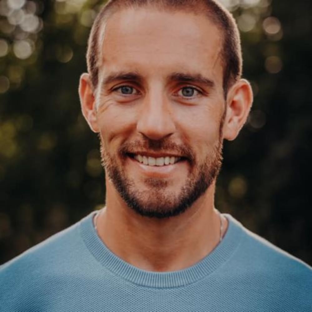 A headshot of Scott Schrader