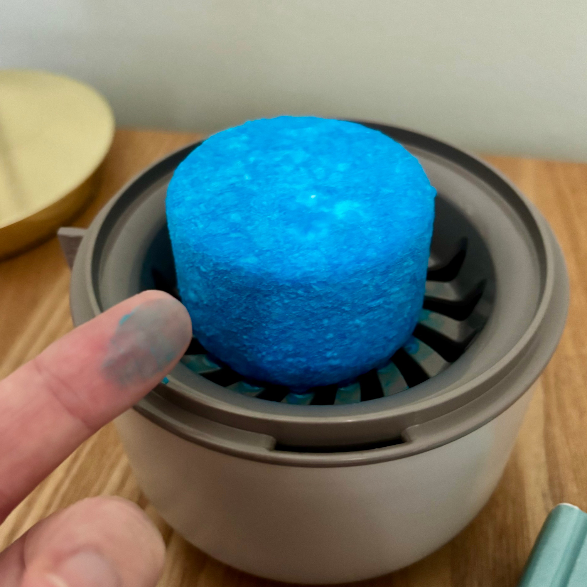 minky damp guard moisture absorber tablet damp and finger showing blue dye