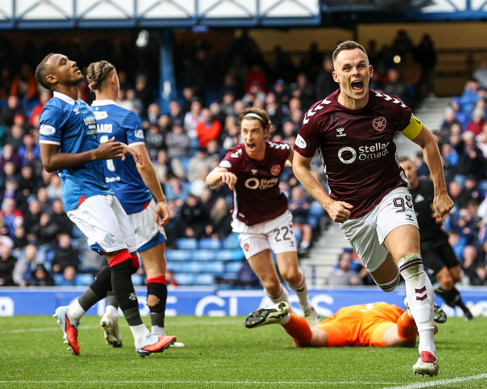 GLASGOW, SCOTLAND - SEPTEMBER 13: Hearts' Lawrence Shankland celebrates as he scores to make it 2-0 during a William Hill Premiership match between Rangers and Heart of Midlothian at Ibrox Stadium, on September 13, 2025, in Glasgow, Scotland. (Photo by Alan Harvey/SNS Group via Getty Images)