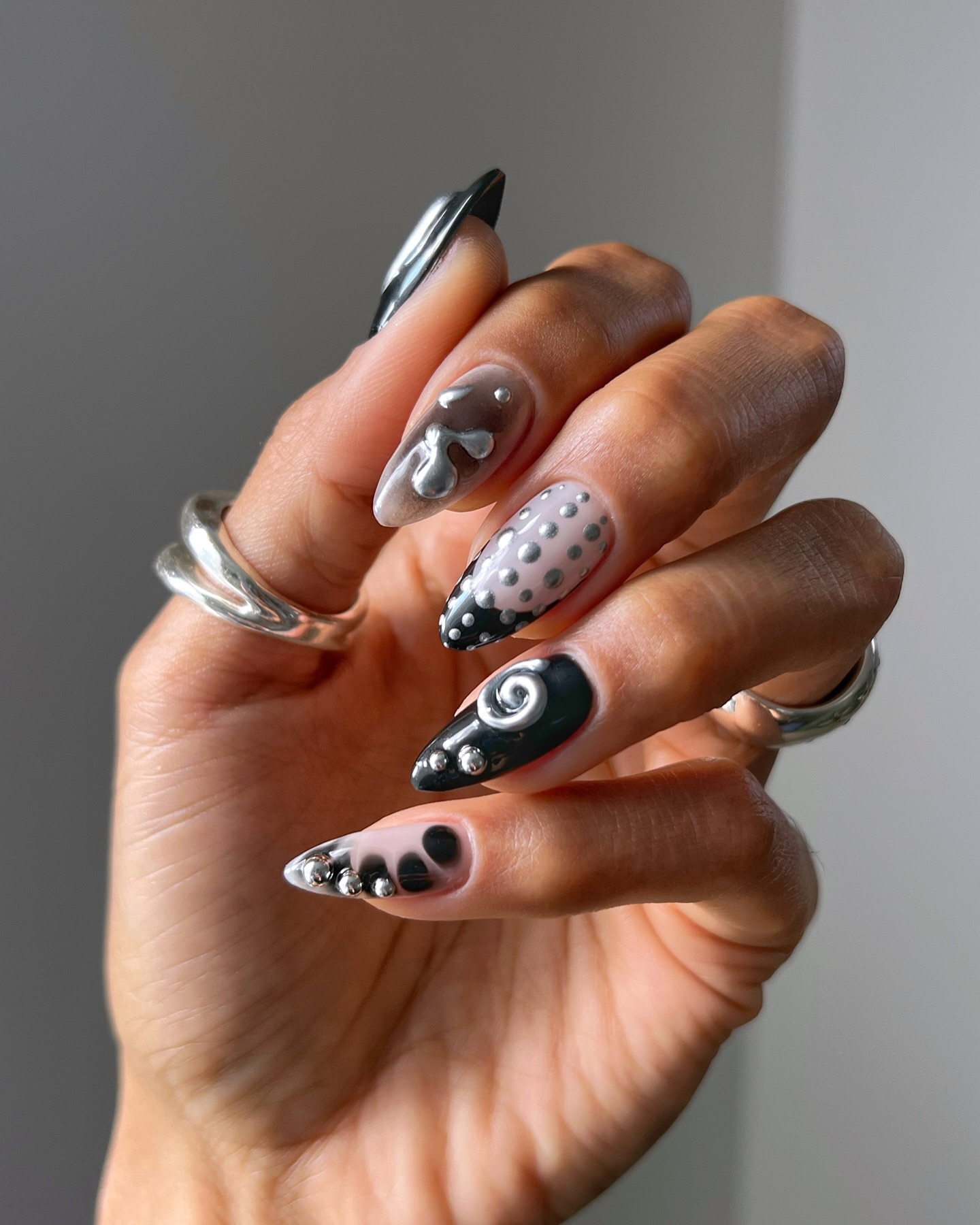 Grunge 3D embellished black nail art