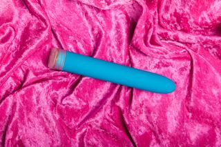 Close Up Of a Vibrator on pink background