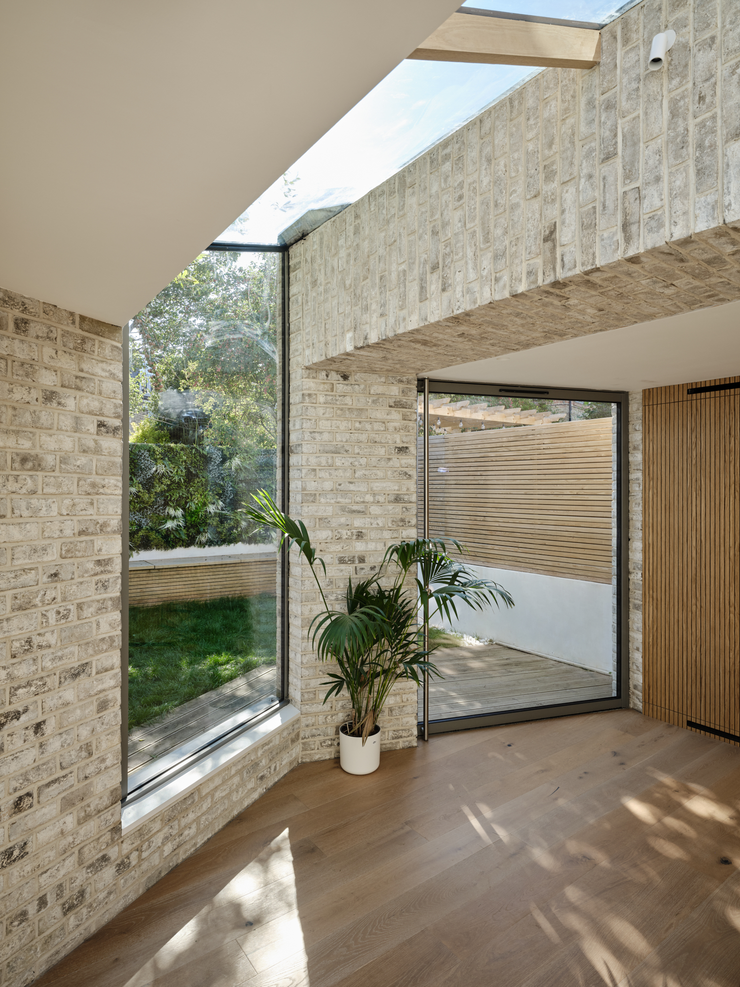The rooflight intersects with the rear window