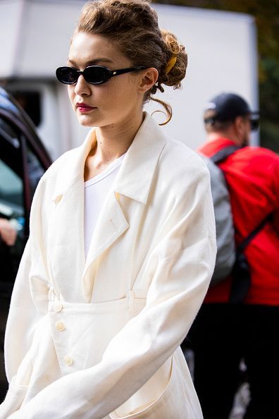 paris, france october 01 gigi hadid, wearing a cream blazer, is seen outside the miu miu show during paris fashion week womenswear spring summer 2020 on october 01, 2019 in paris, france photo by claudio laveniagetty images