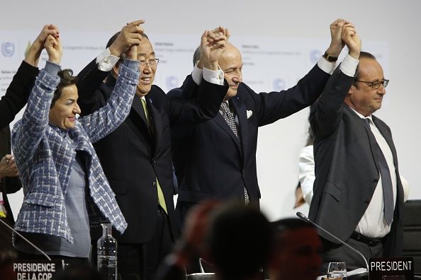 U.N. and French officials celebrate the landmark Paris agreement.