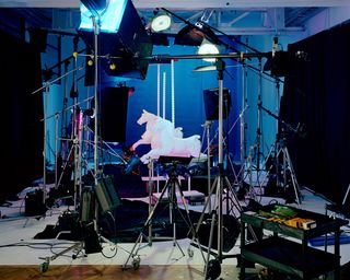 A view of the photographer's complex lighting set-up in his studio