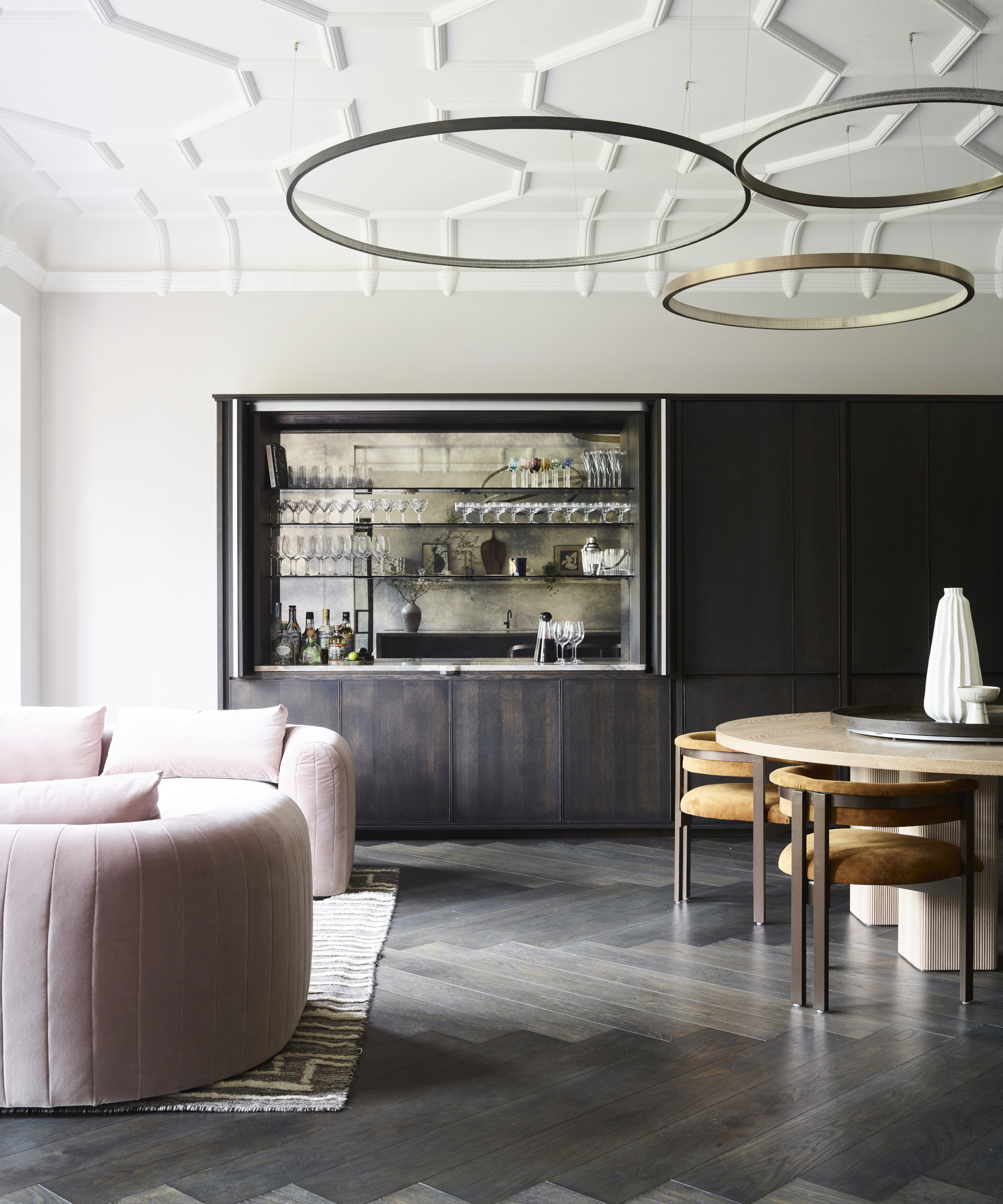 Modern house in a neutral, monochrome palette with pastel pink touches