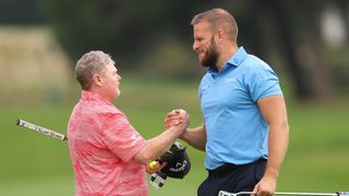 Steven Alderson of Australia shakes hands with Matthieu Lebon of France on the 18th green after winning the G4D Tour @ Estrella Damm N.A. Andalucía Masters