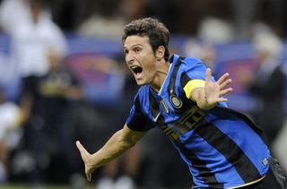 Javier Zanetti celebrates after scoring the winning penalty for Inter against Roma in the Supercoppa Italiana in August 2008.