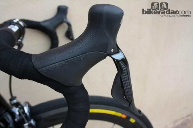 Shimano Dura-Ace 9070 levers are the latest generation of electronic hardware from the Japanese maker and shift across the entire block with one sustained depression