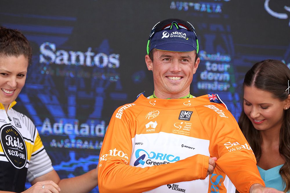 Simon Gerrans (Orica-GreenEdge) pulls on the ochre jersey