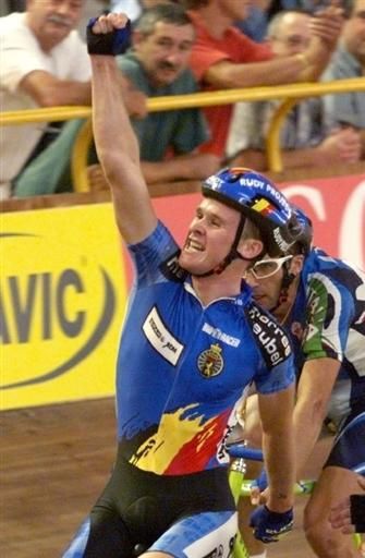 Matthew Gilmore of Belgium jubilates after winning the gold medal of the Madison race during the 1998 World Track Cycling Championships in Bordeaux, southwestern France.