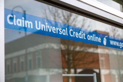 Claim Universal Credit online banner message in window of Job center