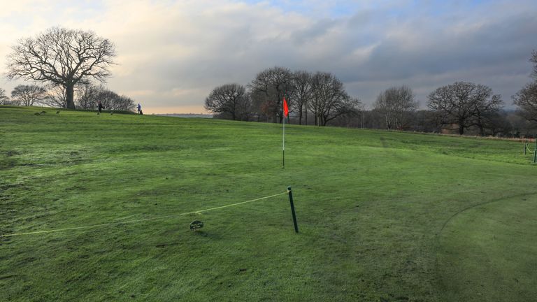 A temporary green pictured during winter