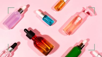 A flatlay of serum droppers of bespoke skincare, one the skincare trends 2022