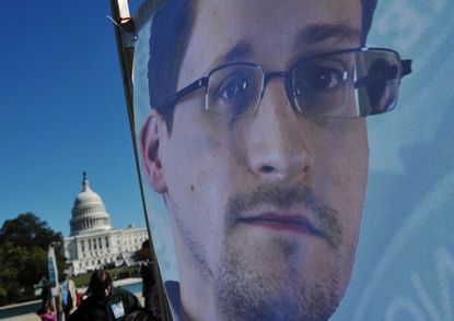 Edward Snowden banner at a rally