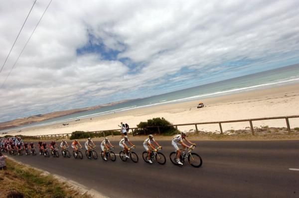 HTC-Columbia leads the Tour Down Under peloton along the beach in South Australia
