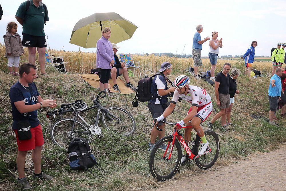 A Katusha rider hugs the gutter during stage 4.