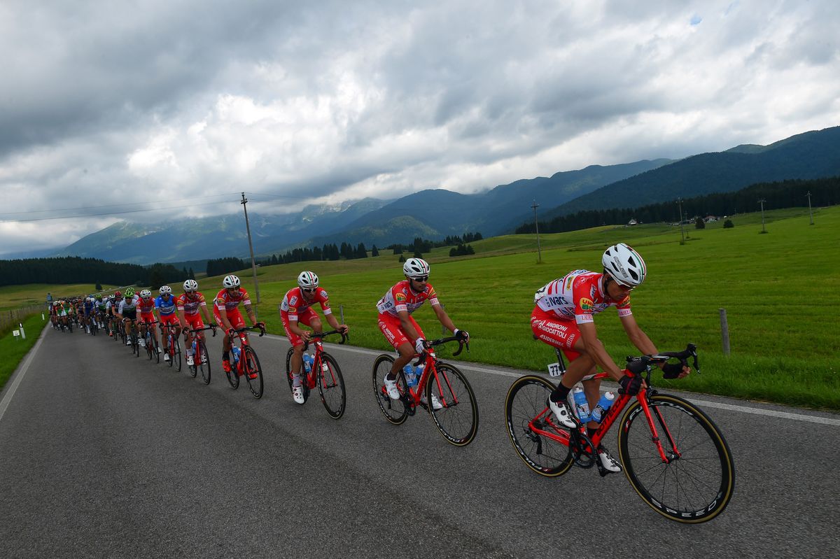 The Androni Gocattoli team protect Ivan Sosa