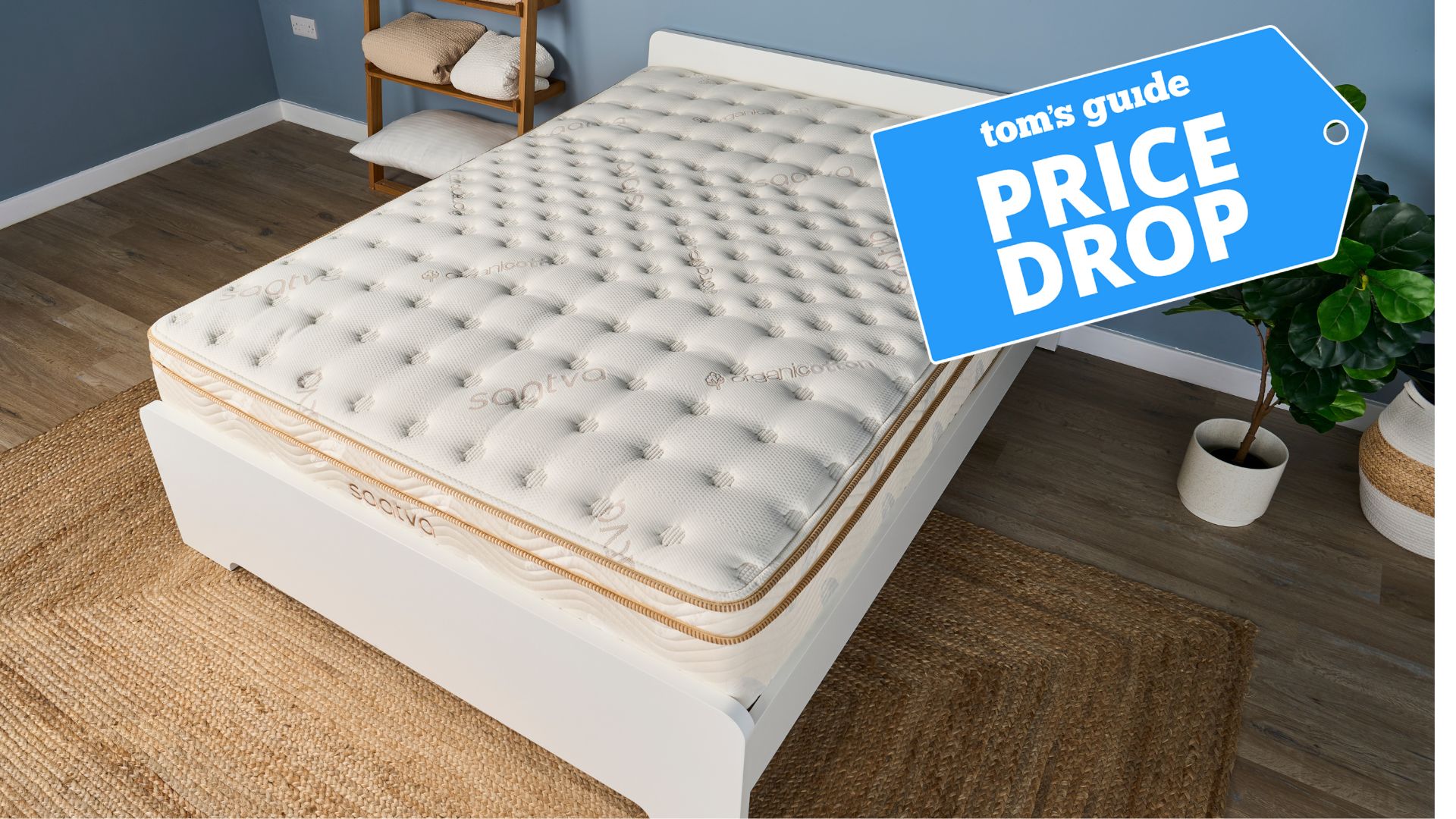 A picture of the Saatva Classic mattress on a white bedroom in a modern bedroom. 