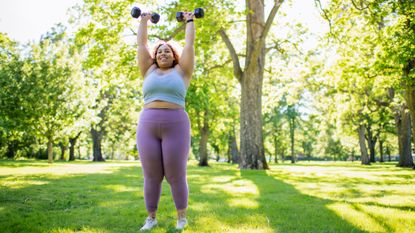 Woman doing workout with dumbbells