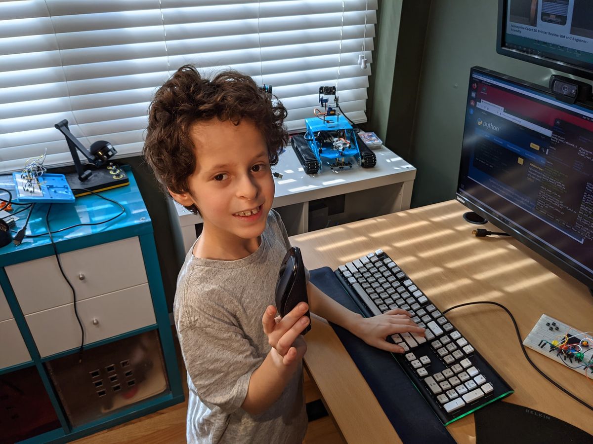 Isaac Using a Mouse at Age 8