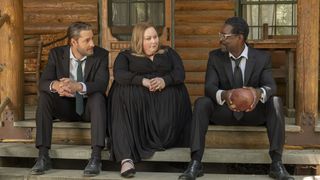Justin Hartley, Chrissy Metz and Sterling K. Brown in black sitting on steps in This Is Us