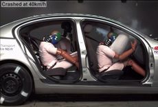 Car crashtest with seatbelts and airbag