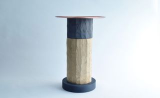 wooden stools and copper-topped side table