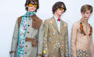 3 male models in decorative clothing