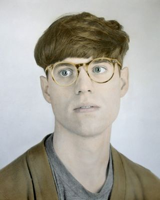 Adam Woodfield- man with glasses