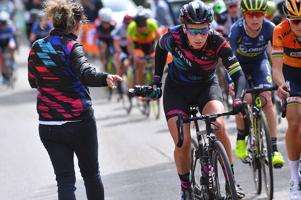 Pauline Ferrand Prevot fuels up in the feedzone
