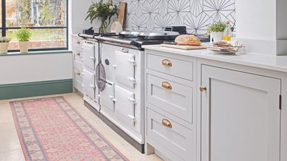 White modern kitchen with jute runner rug.